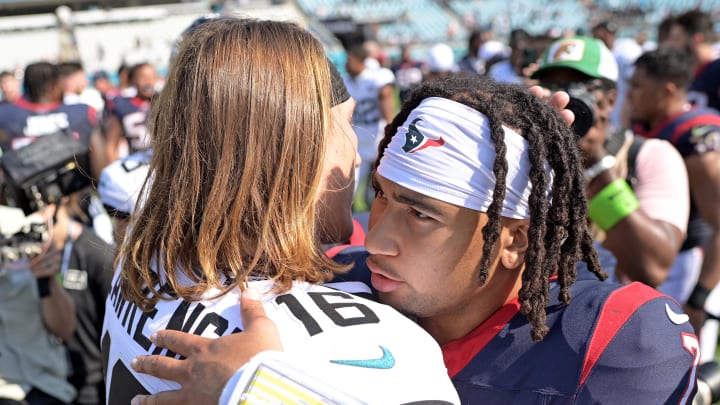 Sep 24, 2023; Jacksonville, Florida, USA; Houston Texans quarterback CJ Stroud (7) and Jacksonville Jaguars quarterback Trevor Lawrence (16) meet at the end of the game at EverBank Stadium. Mandatory Credit: Melina Myers-USA TODAY Sports Sep 24, 2023; Jacksonville, Florida, USA; Houston Texans quarterback CJ Stroud (7) and Jacksonville Jaguars quarterback Trevor Lawrence (16) meet at the end of the game at EverBank Stadium. Mandatory Credit: Melina Myers-USA TODAY Sports