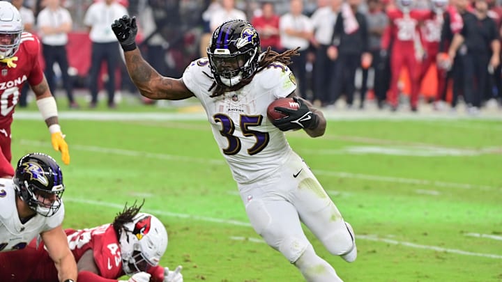 Oct 29, 2023; Glendale, Arizona, USA;  Baltimore Ravens running back Gus Edwards (35) runs for a
