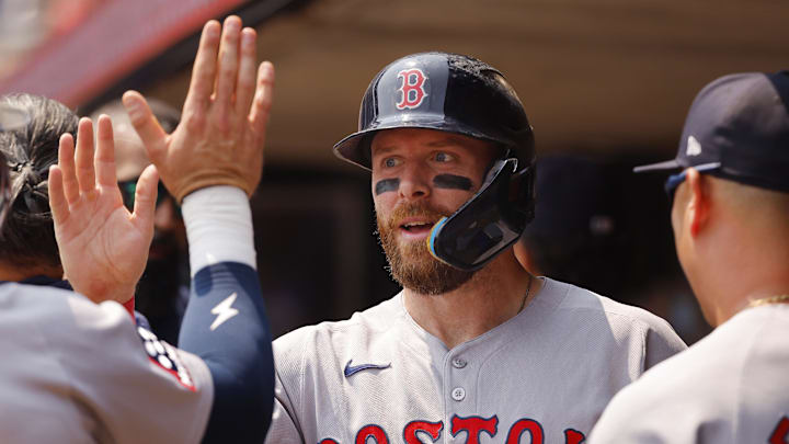 Jul 30, 2025; Minneapolis, Minnesota, USA; Boston Red Sox shortstop Trevor Story (10) celebrates his home run against the Minnesota Twins in the fifth inning at Target Field. Mandatory Credit: Bruce Kluckhohn-Imagn Images