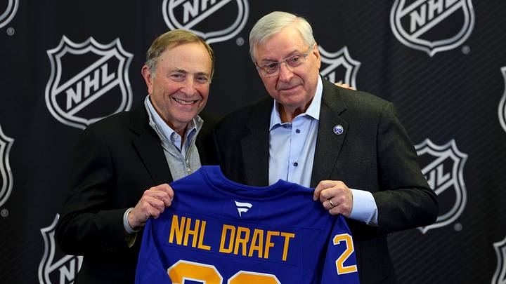 Jan 12, 2026; Buffalo, New York, USA;  NHL Commissioner Gary Bettman and Buffalo Sabres owner Terry Pegula pose for a photo during a press conference announcing the 2026 NHL Draft taking place in Buffalo at KeyBank Center. Mandatory Credit: Timothy T. Ludwig-Imagn Images