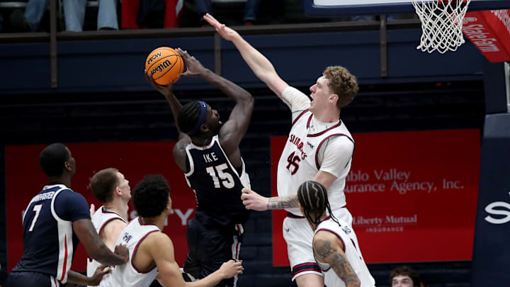 Gonzaga Bulldogs forward Graham Ike (15) goes up for a shot while being defended by St. Mary's Gaels center Andrew McKeever (45)