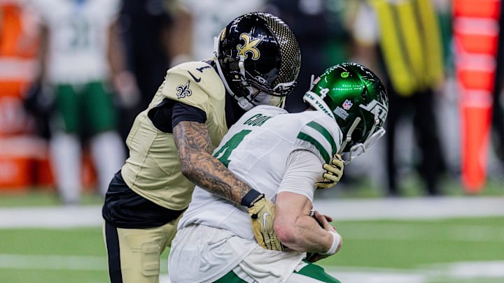 Dec 21, 2025; New Orleans, Louisiana, USA;  New Orleans Saints cornerback Alontae Taylor (1) sacks New York Jets quarterback Brady Cook (4) during the second half  at Caesars Superdome. Mandatory Credit: Stephen Lew-Imagn Images