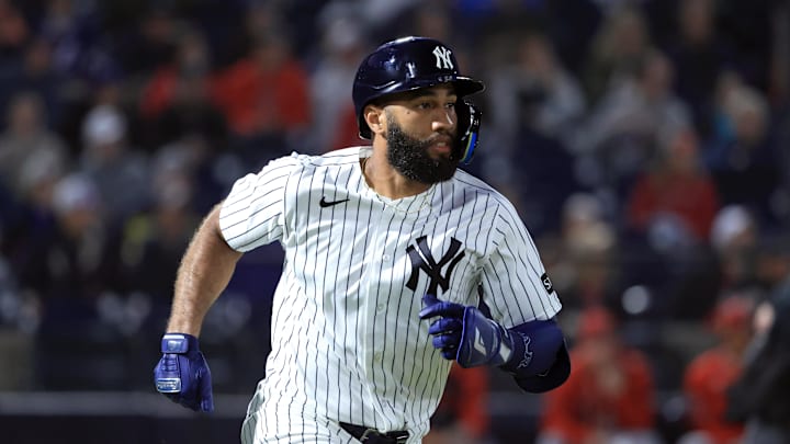 Feb 25, 2026; Tampa, Florida, USA; New York Yankees third baseman Amed Rosario (14) hits a home run during the first inning against the Washington Nationals at George M. Steinbrenner Field. Mandatory Credit: Kim Klement Neitzel-Imagn Images
