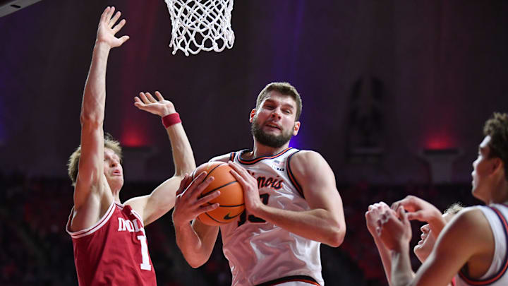 Feb 15, 2026; Champaign, Illinois, USA;  Illinois Fighting Illini center Tomislav Ivisic (13) pulls down a rebound from Indiana Hoosiers forward Reed Bailey (1) during the second half at State Farm Center. Mandatory Credit: Ron Johnson-Imagn Images