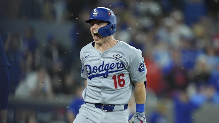 Nov 1, 2025; Toronto, Ontario, CAN; Los Angeles Dodgers catcher Will Smith (16) celebrates after hitting a home run against the Toronto Blue Jays in the eleventh inning during game seven of the 2025 MLB World Series at Rogers Centre. Mandatory Credit: John E. Sokolowski-Imagn Images