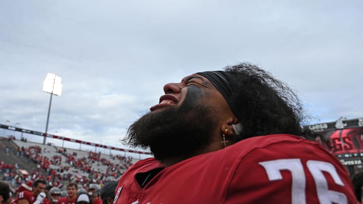 Oct 19, 2024; Pullman, Washington, USA; Washington State Cougars offensive lineman Esa Pole (76) celebrates after a game against the Hawaii Warriors in the second half at Gesa Field at Martin Stadium. Mandatory Credit: James Snook-Imagn Images
