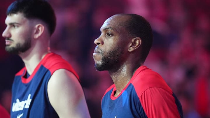 Mar 17, 2025; Portland, Oregon, USA; Washington Wizards small forward Khris Middleton (32) stands for the National Anthem before the game against the Portland Trail Blazers at Moda Center. Mandatory Credit: Soobum Im-Imagn Images
