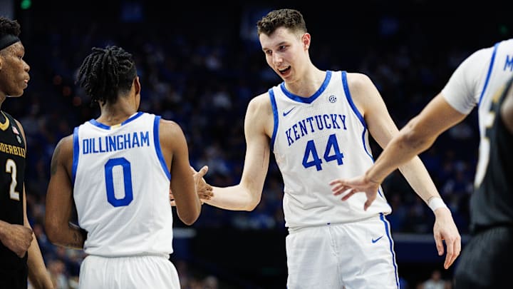 Mar 6, 2024; Lexington, Kentucky, USA; Kentucky Wildcats forward Zvonimir Ivisic (44) fives guard Rob Dillingham (0) after a play against Vanderbilt. 