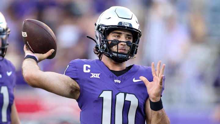 Oct 4, 2024; Fort Worth, Texas, USA; TCU Horned Frogs quarterback Josh Hoover (10) goes through drills before the game against the Houston Cougars at Amon G. Carter Stadium. Mandatory Credit: Tim Heitman-Imagn Images