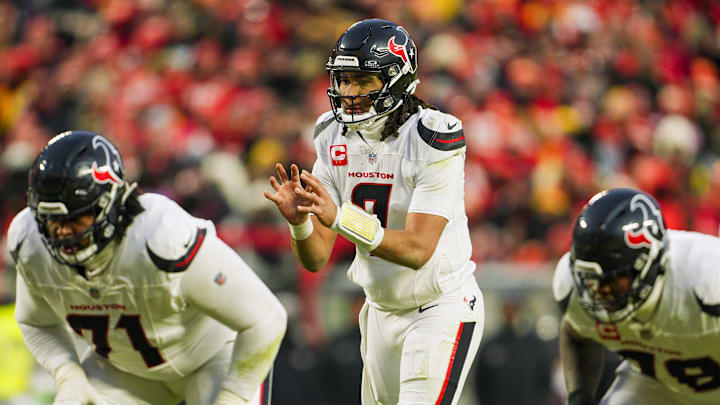 Jan 18, 2025; Kansas City, Missouri, USA; Houston Texans quarterback C.J. Stroud (7) gets ready before the snap during the second half against the Kansas City Chiefs in a 2025 AFC divisional round game at GEHA Field at Arrowhead Stadium. Mandatory Credit: Jay Biggerstaff-Imagn Images