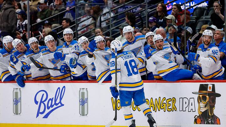 Apr 5, 2026; Denver, Colorado, USA; St. Louis Blues center Robert Thomas (18) celebrates with the bench after his hat trick goal against the Colorado Avalanche in the third period at Ball Arena. Mandatory Credit: Isaiah J. Downing-Imagn Images