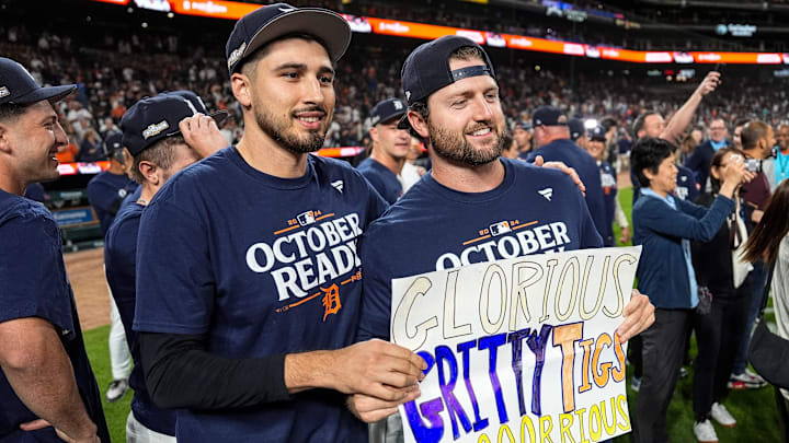 Tigers pitchers Alex Faedo and Casey Mize celebrate after 4-1 win over the White Sox to clinch a wild card spot.