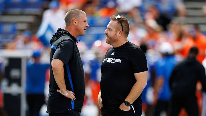 Sep 6, 2025; Gainesville, Florida, USA; Florida Gators head coach Billy Napiera and South Florida Bulls head coach Alex Golesh talk before the game at Ben Hill Griffin Stadium. Mandatory Credit: Matt Pendleton-Imagn Images Sep 6, 2025; Gainesville, Florida, USA; Florida Gators head coach Billy Napiera and South Florida Bulls head coach Alex Golesh talk before the game at Ben Hill Griffin Stadium. Mandatory Credit: Matt Pendleton-Imagn Images