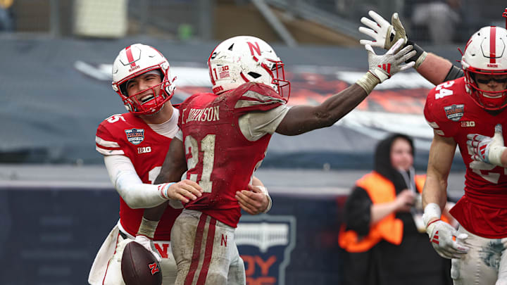 Nebraska running back Emmett Johnson celebrates with teammates after a touchdown during the Huskers' 2024 Pinstripe Bowl game against Boston College. Nebraska running back Emmett Johnson celebrates with teammates after a touchdown during the Huskers' 2024 Pinstripe Bowl game against Boston College.