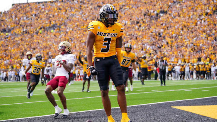 Sep 14, 2024; Columbia, Missouri, USA; Missouri Tigers wide receiver Luther Burden III (3) celebrates after scoring a touchdown against the Boston College Eagles during the first half at Faurot Field at Memorial Stadium. Mandatory Credit: Denny Medley-Imagn Images