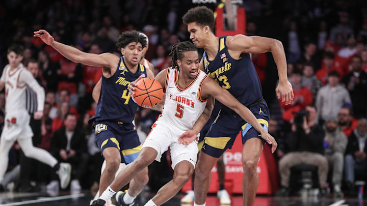 Jan 20, 2024; New York, New York, USA;  St. John's Red Storm guard Daniss Jenkins (5) is doubled