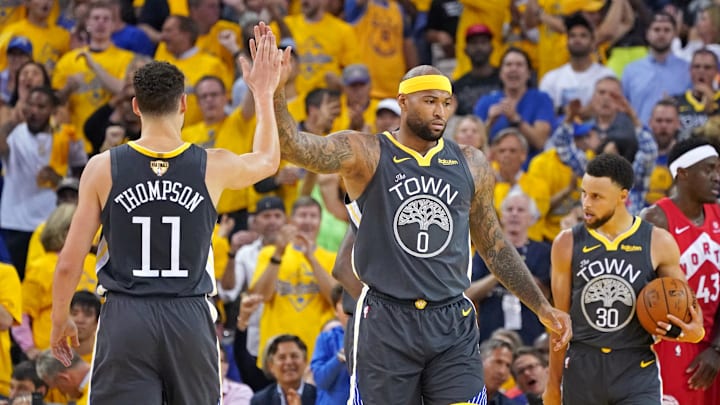 Jun 13, 2019; Oakland, CA, USA; Golden State Warriors center DeMarcus Cousins (0) celebrates with Golden State Warriors guard Klay Thompson (11) during the first quarter against the Toronto Raptors in game six of the 2019 NBA Finals at Oracle Arena. Mandatory Credit: Kyle Terada-Imagn Images Jun 13, 2019; Oakland, CA, USA; Golden State Warriors center DeMarcus Cousins (0) celebrates with Golden State Warriors guard Klay Thompson (11) during the first quarter against the Toronto Raptors in game six of the 2019 NBA Finals at Oracle Arena. Mandatory Credit: Kyle Terada-Imagn Images