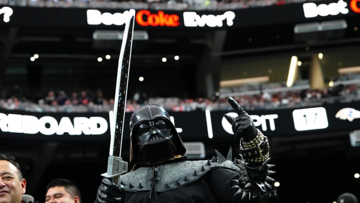 Jan 7, 2024; Paradise, Nevada, USA; A Las Vegas Raiders fan in costume cheers in a game between the Raiders and the Denver Broncos during the fourth quarter at Allegiant Stadium. Mandatory Credit: Stephen R. Sylvanie-USA TODAY Sports