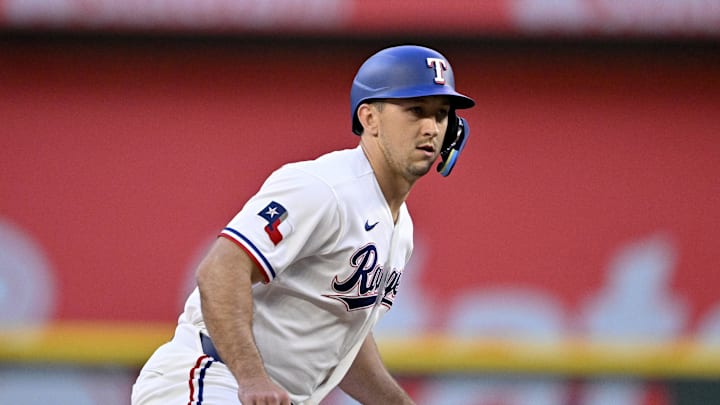 Apr 6, 2026; Arlington, Texas, USA; Texas Rangers left fielder Wyatt Langford (36) leads off from second base during the game between the Rangers and the Mariners at Globe Life Field. Mandatory Credit: Jerome Miron-Imagn Images