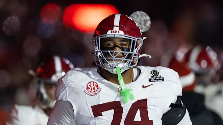 Dec 19, 2025; Norman, OK, USA; Alabama Crimson Tide offensive lineman Kadyn Proctor (74) against the Oklahoma Sooners during the CFP National Playoff First Round at Gaylord Family Oklahoma Memorial Stadium. 