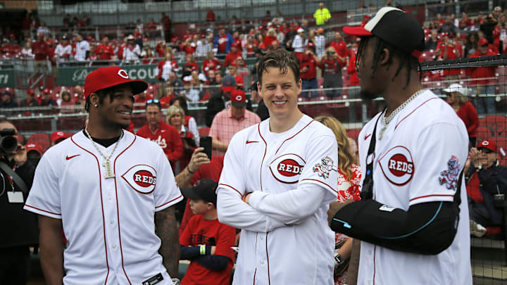 Ja'Marr Chase, Joe Burrow and Tee Higgins before the Reds' 10–5 loss to the Guardians on April 12, 2022.