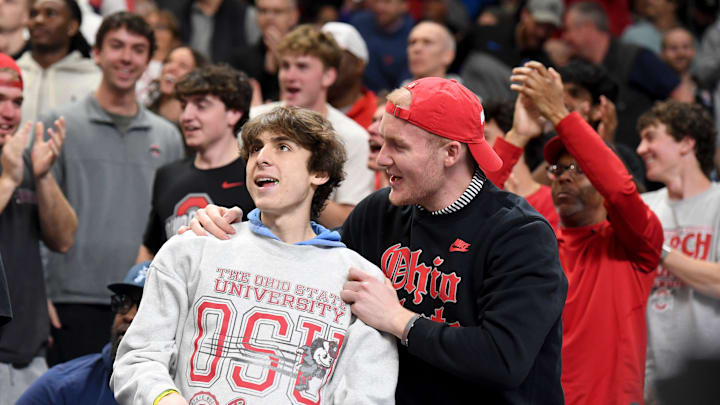 Fans cheer Thursday, March 19, 2026, during the NCAA Men’s Basketball Tournament first round game between the Ohio State Buckeyes and the TCU Horned Frogs at Bon Secours Wellness Arena in Greenville, South Carolina.