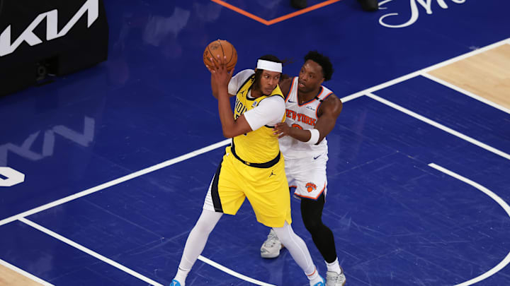 Indiana Pacers center Myles Turner controls the ball against New York Knicks forward OG Anunoby. Mandatory Credit: Brad Penner-Imagn Images