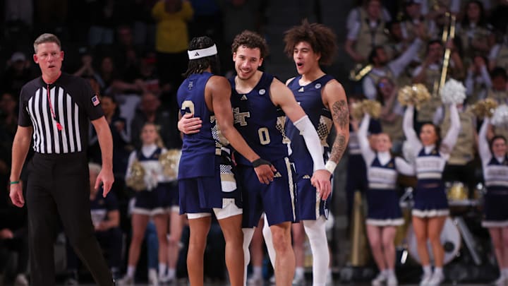 Feb 1, 2025; Atlanta, Georgia, USA; Georgia Tech Yellow Jackets guard Javian McCollum (2) and guard Lance Terry (0) and guard Naithan George (1) celebrate in the final seconds of a victory over the Louisville Cardinals at McCamish Pavilion. Mandatory Credit: Brett Davis-Imagn Images
Feb 1, 2025; Atlanta, Georgia, USA; Georgia Tech Yellow Jackets guard Javian McCollum (2) and guard Lance Terry (0) and guard Naithan George (1) celebrate in the final seconds of a victory over the Louisville Cardinals at McCamish Pavilion. Mandatory Credit: Brett Davis-Imagn Images
