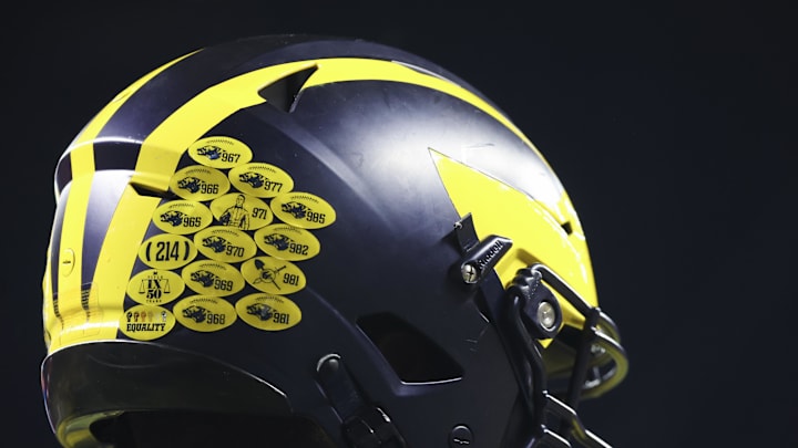 Dec 3, 2022; Indianapolis, Indiana, USA; A Michigan Wolverines player   s helmet before the Big Ten Championship against the Purdue Boilermakers at Lucas Oil Stadium. Mandatory Credit: Trevor Ruszkowski-Imagn Images