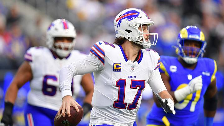 Dec 8, 2024; Inglewood, California, USA; Buffalo Bills quarterback Josh Allen (17) moves out to pass against the Los Angeles Rams during the first half at SoFi Stadium. Mandatory Credit: Gary A. Vasquez-Imagn Images