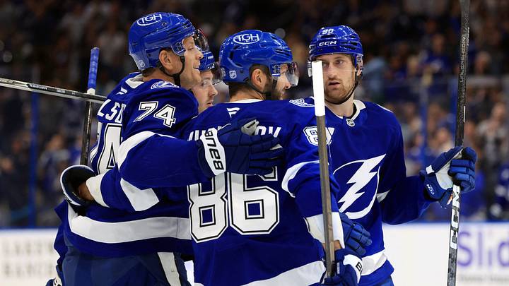 Oct 8, 2026; Tampa, Florida, USA; Tampa Bay Lightning defenseman John Carlson (74) is congratulated after he scored a gain against the Minnesota Wild during the first period at Benchmark International Arena. Mandatory Credit: Kim Klement Neitzel-Imagn Images Oct 8, 2026; Tampa, Florida, USA; Tampa Bay Lightning defenseman John Carlson (74) is congratulated after he scored a gain against the Minnesota Wild during the first period at Benchmark International Arena. Mandatory Credit: Kim Klement Neitzel-Imagn Images