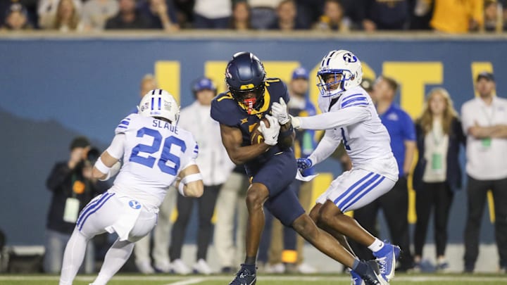 Nov 4, 2023; Morgantown, West Virginia, USA; West Virginia Mountaineers wide receiver Traylon Ray (7) makes a catch during the first quarter against the Brigham Young Cougars at Mountaineer Field at Milan Puskar Stadium. Mandatory Credit: Ben Queen-Imagn Images