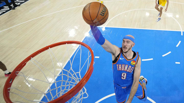 Jun 22, 2025; Oklahoma City, Oklahoma, USA; Oklahoma City Thunder guard Alex Caruso (9) dunks against the Indiana Pacers during the first half of game seven of the 2025 NBA Finals at Paycom Center. Mandatory Credit: Kyle Terada-Imagn Images