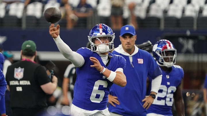 Sep 14, 2025; Arlington, Texas, USA; New York Giants quarterback Jaxson Dart (6) warms up before the game against the Dallas Cowboys at AT&T Stadium.  