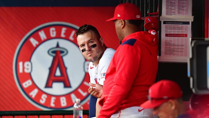 Jun 10, 2025; Anaheim, California, USA; Los Angeles Angels designated hitter Mike Trout (27) watches game action against the Athletics during the fifth inning at Angel Stadium. Mandatory Credit: Gary A. Vasquez-Imagn Images