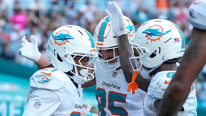Miami Dolphins wide receiver Kevin Coleman Jr. (21) celebrates with Greg Dulcich (85) a touchdown catch in the fourth quarter of the NFL Week 5 game between the Miami Dolphins and the Cincinnati Bengals at Hard Rock Stadium in Miami Gardens, Florida, on Sunday, Oct. 11, 2026.