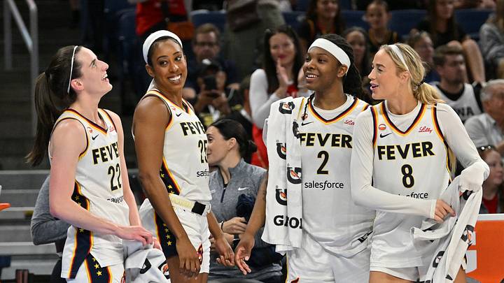 Aug 23, 2026; Chicago, Illinois, USA; Indiana Fever guard Caitlin Clark (22), forward Monique Billings (25), forward Myisha Hines-Allen (2) and guard Sophie Cunningham (8) celebrate from the bench against the Chicago Sky during the second half at Wintrust Arena. Mandatory Credit: Patrick Gorski-Imagn Images Aug 23, 2026; Chicago, Illinois, USA; Indiana Fever guard Caitlin Clark (22), forward Monique Billings (25), forward Myisha Hines-Allen (2) and guard Sophie Cunningham (8) celebrate from the bench against the Chicago Sky during the second half at Wintrust Arena. Mandatory Credit: Patrick Gorski-Imagn Images