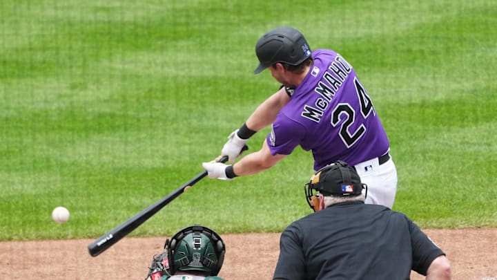 Jul 30, 2023; Denver, Colorado, USA; Colorado Rockies third baseman Ryan McMahon (24) RBI doubles in