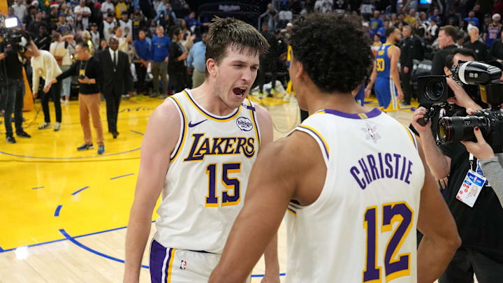 Dec 25, 2024; San Francisco, California, USA; Los Angeles Lakers guard Austin Reaves (15) celebrates with guard Max Christie (12) after making the game-winning basket to defeat the Golden State Warriors at Chase Center. Mandatory Credit: Darren Yamashita-Imagn Images Dec 25, 2024; San Francisco, California, USA; Los Angeles Lakers guard Austin Reaves (15) celebrates with guard Max Christie (12) after making the game-winning basket to defeat the Golden State Warriors at Chase Center. Mandatory Credit: Darren Yamashita-Imagn Images
