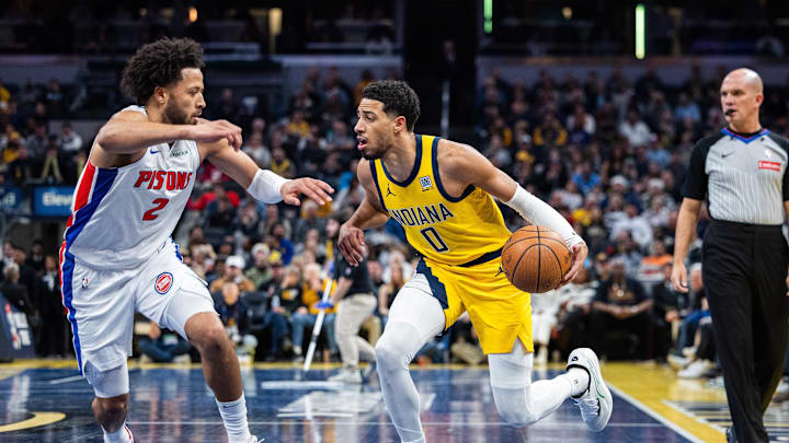Nov 29, 2024; Indianapolis, Indiana, USA; Indiana Pacers guard Tyrese Haliburton (0) dribbles the ball while Detroit Pistons guard Cade Cunningham (2) defends in the first half  at Gainbridge Fieldhouse. Mandatory Credit: Trevor Ruszkowski-Imagn Images