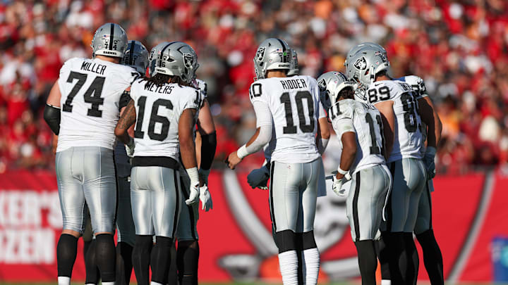 Dec 8, 2024; Tampa, Florida, USA; Las Vegas Raiders quarterback Desmond Ridder (10) leads a huddle against the Tampa Bay Buccaneers in the fourth quarter at Raymond James Stadium. Mandatory Credit: Nathan Ray Seebeck-Imagn Images Dec 8, 2024; Tampa, Florida, USA; Las Vegas Raiders quarterback Desmond Ridder (10) leads a huddle against the Tampa Bay Buccaneers in the fourth quarter at Raymond James Stadium. Mandatory Credit: Nathan Ray Seebeck-Imagn Images