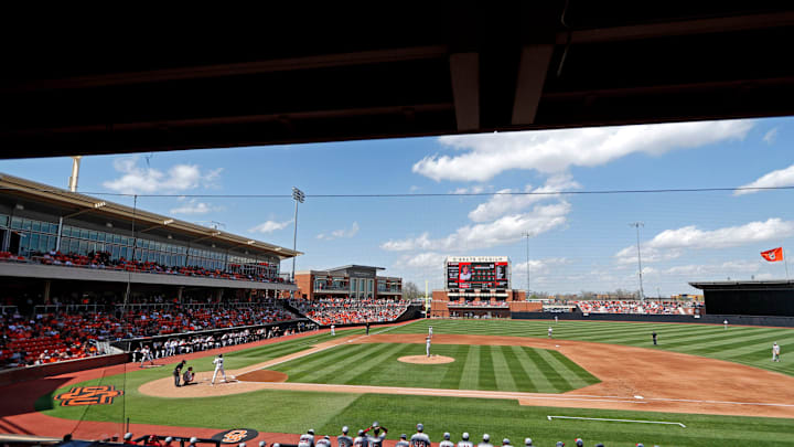 Fans watch a Bedlam baseball game between the Oklahoma State Cowboys (OSU) and the Oklahoma Sooners.
