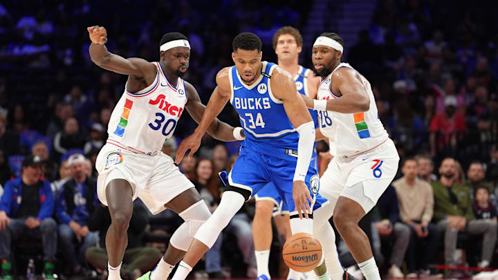 Apr 3, 2025; Philadelphia, Pennsylvania, USA; Milwaukee Bucks forward Giannis Antetokounmpo (34) controls the ball against Philadelphia 76ers center Adem Bona (30) and forward Guerschon Yabusele (28) in the fourth quarter at Wells Fargo Center. Mandatory Credit: Kyle Ross-Imagn Images Apr 3, 2025; Philadelphia, Pennsylvania, USA; Milwaukee Bucks forward Giannis Antetokounmpo (34) controls the ball against Philadelphia 76ers center Adem Bona (30) and forward Guerschon Yabusele (28) in the fourth quarter at Wells Fargo Center. Mandatory Credit: Kyle Ross-Imagn Images