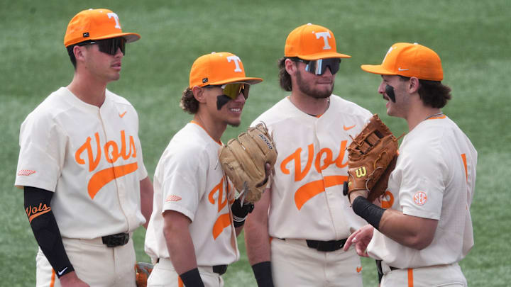 From left, Tennessee infielders Dean Curley (1), Manny Marin (4), Gavin Kilen (6), and Andrew Fisher (11) gather to chat during a pause in the NCAA college baseball game against St. Bonaventure on Sunday, March 9, 2025, in Knoxville, Tenn. From left, Tennessee infielders Dean Curley (1), Manny Marin (4), Gavin Kilen (6), and Andrew Fisher (11) gather to chat during a pause in the NCAA college baseball game against St. Bonaventure on Sunday, March 9, 2025, in Knoxville, Tenn.