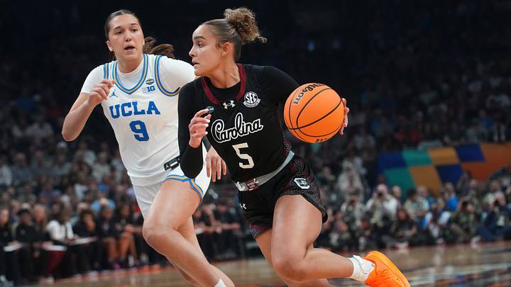 South Carolina Gamecocks guard Tessa Johnson (5) drives past UCLA Bruins guard Lena Bilić (9) during their NCAA women's basketball national championship game at Mortgage Matchup Center in Phoenix on April 5, 2026. South Carolina Gamecocks guard Tessa Johnson (5) drives past UCLA Bruins guard Lena Bilić (9) during their NCAA women's basketball national championship game at Mortgage Matchup Center in Phoenix on April 5, 2026.