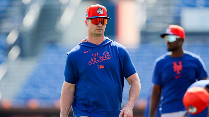 Feb 19, 2025; Port St. Lucie, FL, USA; New York Mets first baseman Pete Alonso (20) looks on from the field during a spring training workout at Clover Park. Mandatory Credit: Sam Navarro-Imagn Images