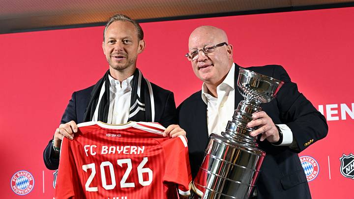 Bayern Munich chief marketing and sales officer Rouven Kasper and NHL deputy commissioner Bill Daly meet in Munich - Saebener Strasse, Munich, Germany - August 20, 2026 Bayern Munich chief marketing and sales officer Rouven Kasper and NHL deputy commissioner Bill Daly pose with a jersey and a trophy after a press conference REUTERS/Angelika Warmuth Bayern Munich chief marketing and sales officer Rouven Kasper and NHL deputy commissioner Bill Daly meet in Munich - Saebener Strasse, Munich, Germany - August 20, 2026 Bayern Munich chief marketing and sales officer Rouven Kasper and NHL deputy commissioner Bill Daly pose with a jersey and a trophy after a press conference REUTERS/Angelika Warmuth