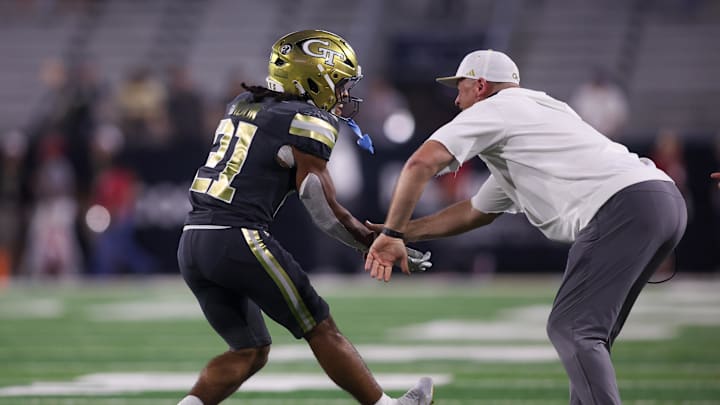 Sep 20, 2025; Atlanta, Georgia, USA; Georgia Tech Yellow Jackets running back Daylon Gordon (21) celebrates with head coach Brent Key after a touchdown against the Temple Owls in the fourth quarter at Bobby Dodd Stadium at Hyundai Field. Mandatory Credit: Brett Davis-Imagn Images