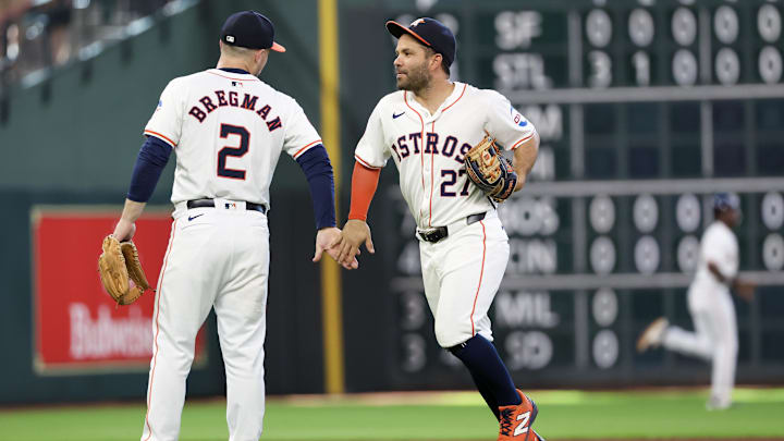 Jun 23, 2024; Houston, Texas, USA;  Houston Astros third baseman Alex Bregman (2) and second baseman Jose Altuve (27) celebrate after defeating the Baltimore Orioles at Minute Maid Park.
