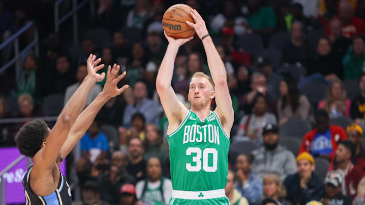 Mar 25, 2024; Atlanta, Georgia, USA; Boston Celtics forward Sam Hauser (30) shoots against the Atlanta Hawks in the second quarter at State Farm Arena. Mandatory Credit: Brett Davis-Imagn Images
